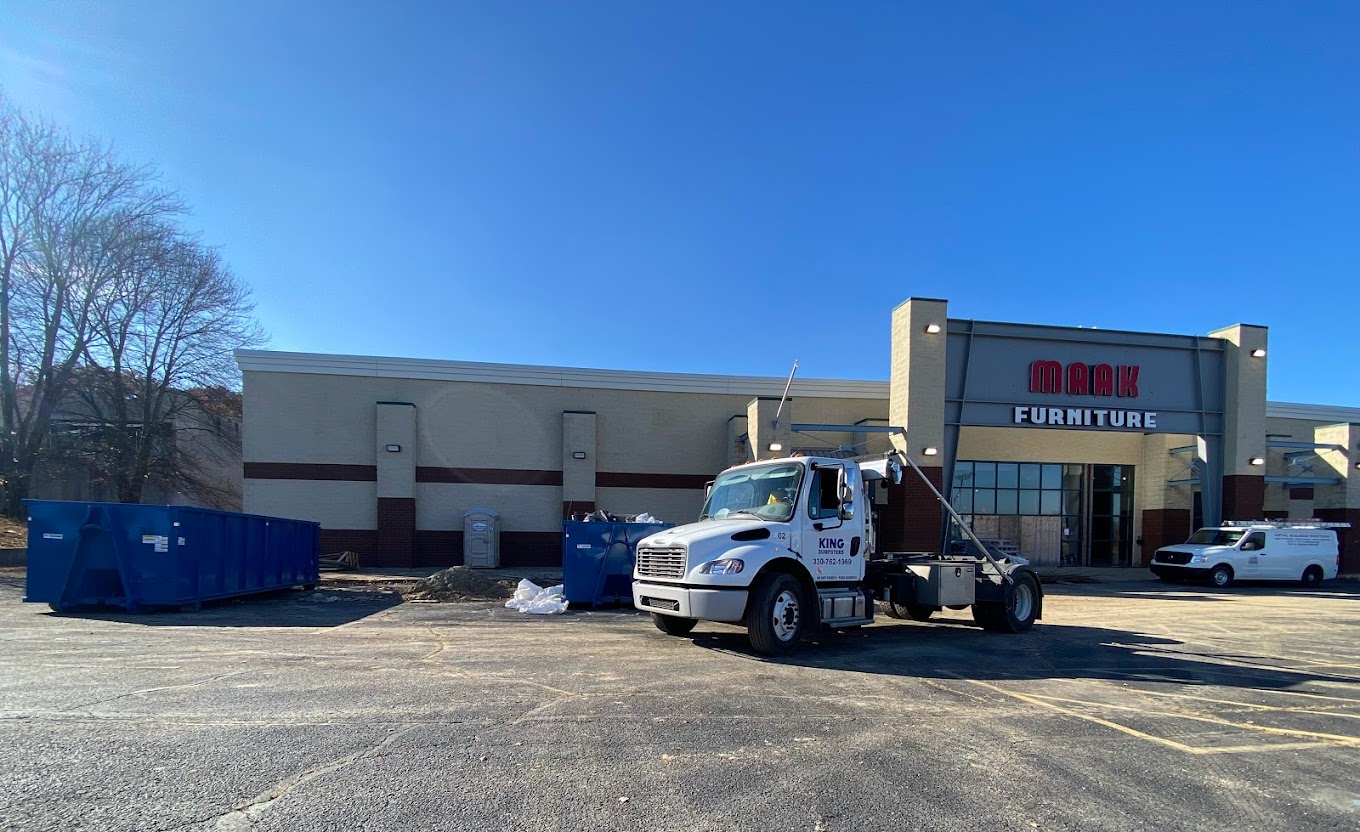 Roll off dumpster in parking lot