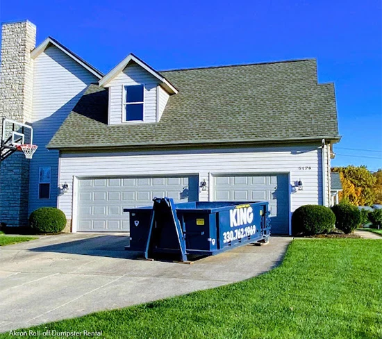 10 yard dumpster in driveway in Canton, ohio